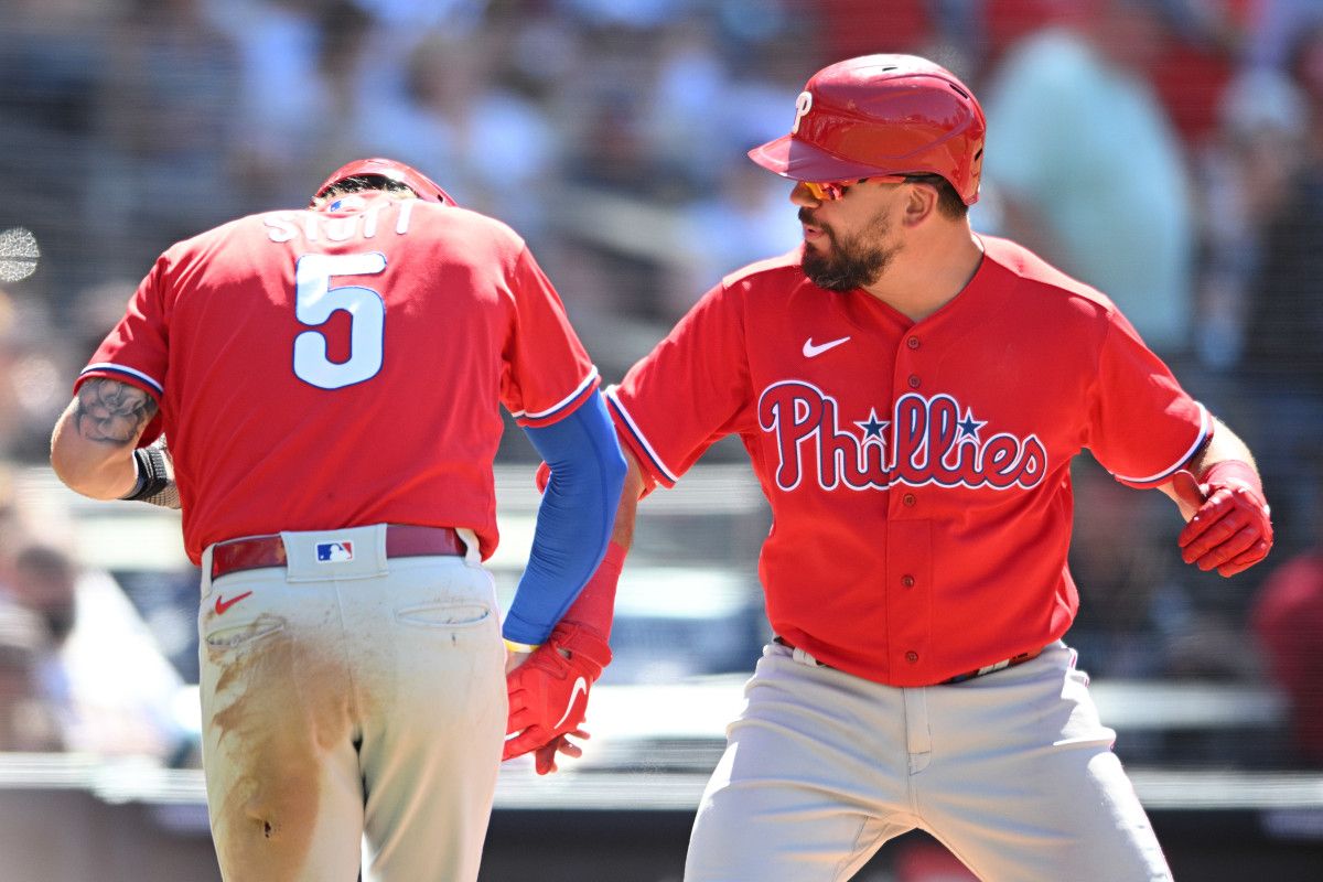 Kyle Schwarber celebrates with Bryson Stott.