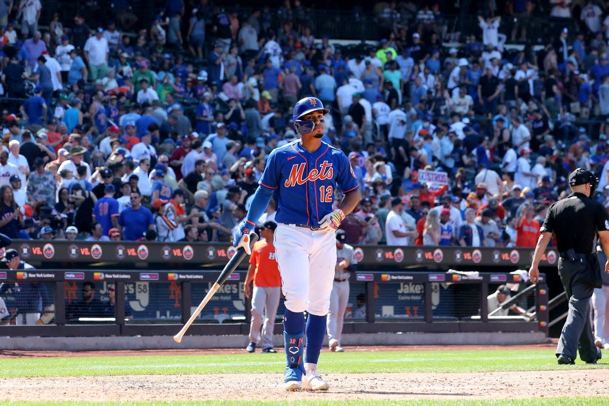 Jun 29, 2022; New York City, New York, USA; New York Mets shortstop Francisco Lindor (12) reacts as he walks off the field after striking out to end the game against the Houston Astros at Citi Field. Mandatory Credit: Brad Penner-USA TODAY Sports