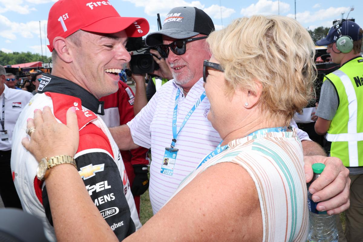 Scott McLaughlin celebrates with his parents, who saw him race in America for the first time ever, following his win Sunday at Mid-Ohio. Photo courtesy IndyCar.
