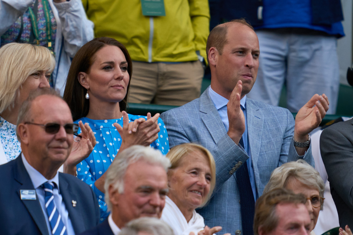 Jul 5, 2022; London, England, United Kingdom; Kate and William, The Duke and Duchess of Cambridge stand to applaud as Cameron Norrie (GBR) celebrate after match point in his quarterfinals match against David Goffin (BEL) on Number One court at the 2022 Wimbledon Championships at All England Lawn Tennis and Croquet Club