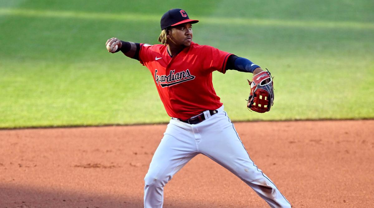 Jun 29, 2022; Cleveland, Ohio, USA; Cleveland Guardians third baseman Jose Ramirez (11) throws to first base in the second inning against the Minnesota Twins at Progressive Field.