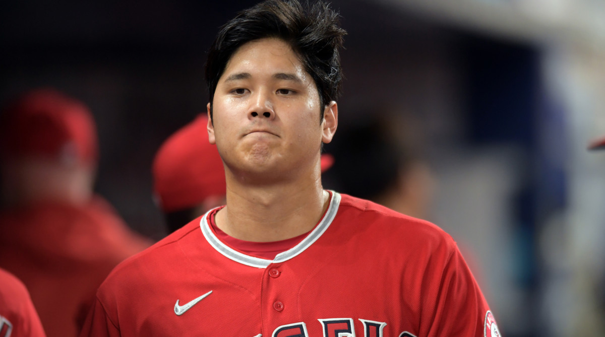 Los Angeles Angels designated hitter Shohei Ohtani (17) walks along the dugout in the middle of the seventh inning against the Miami Marlins at loanDepot Park.