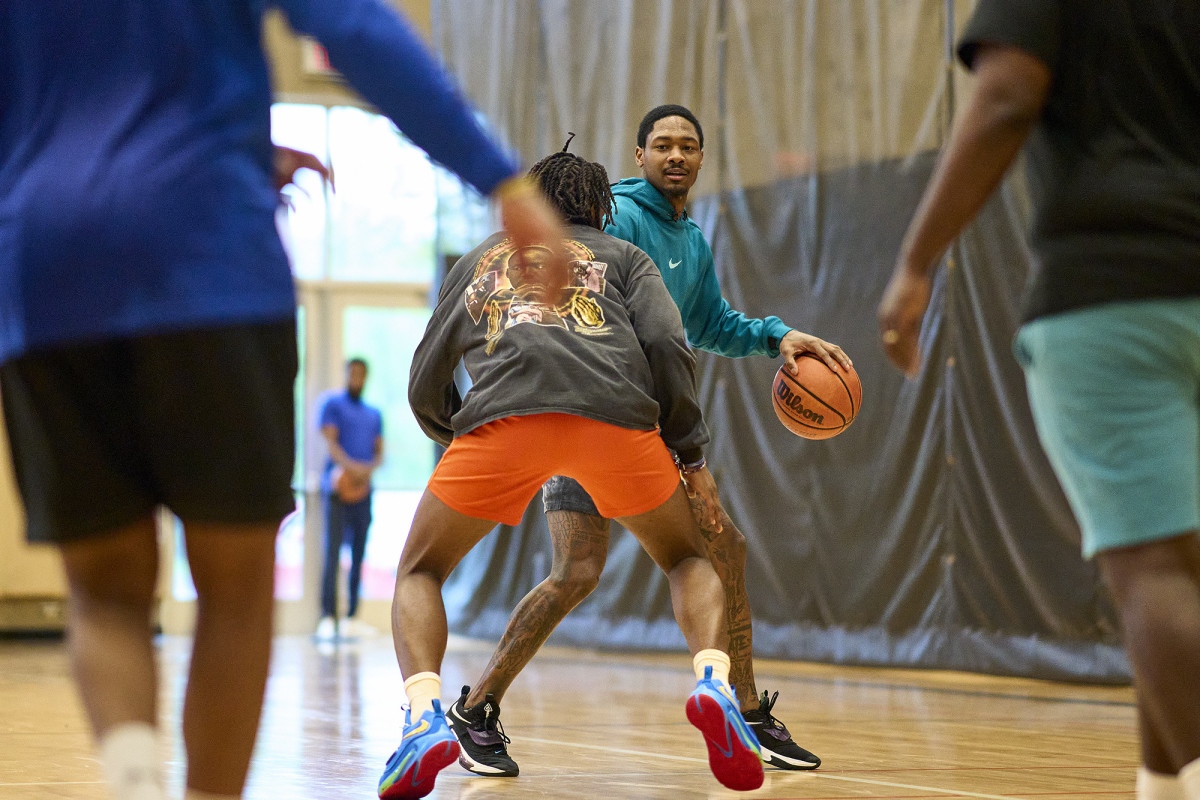 Stefon and Trevon Diggs play against each other in a game of pickup basketball