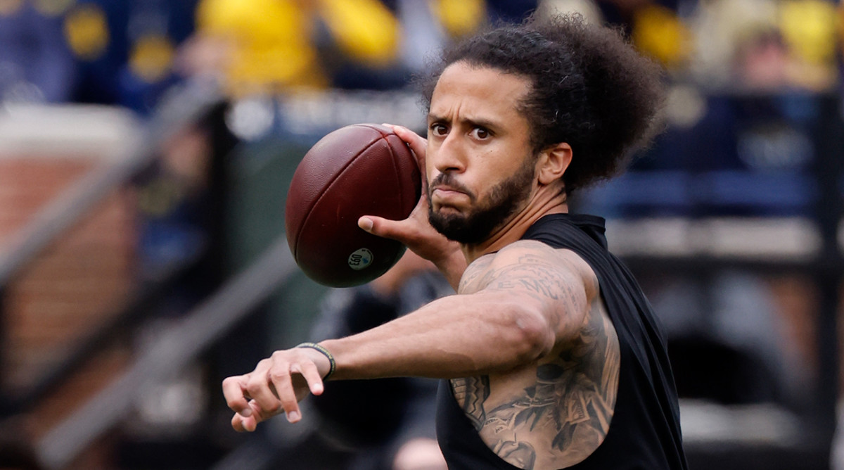 Colin Kaepernick passes during halftime at the Michigan Spring game at Michigan Stadium.