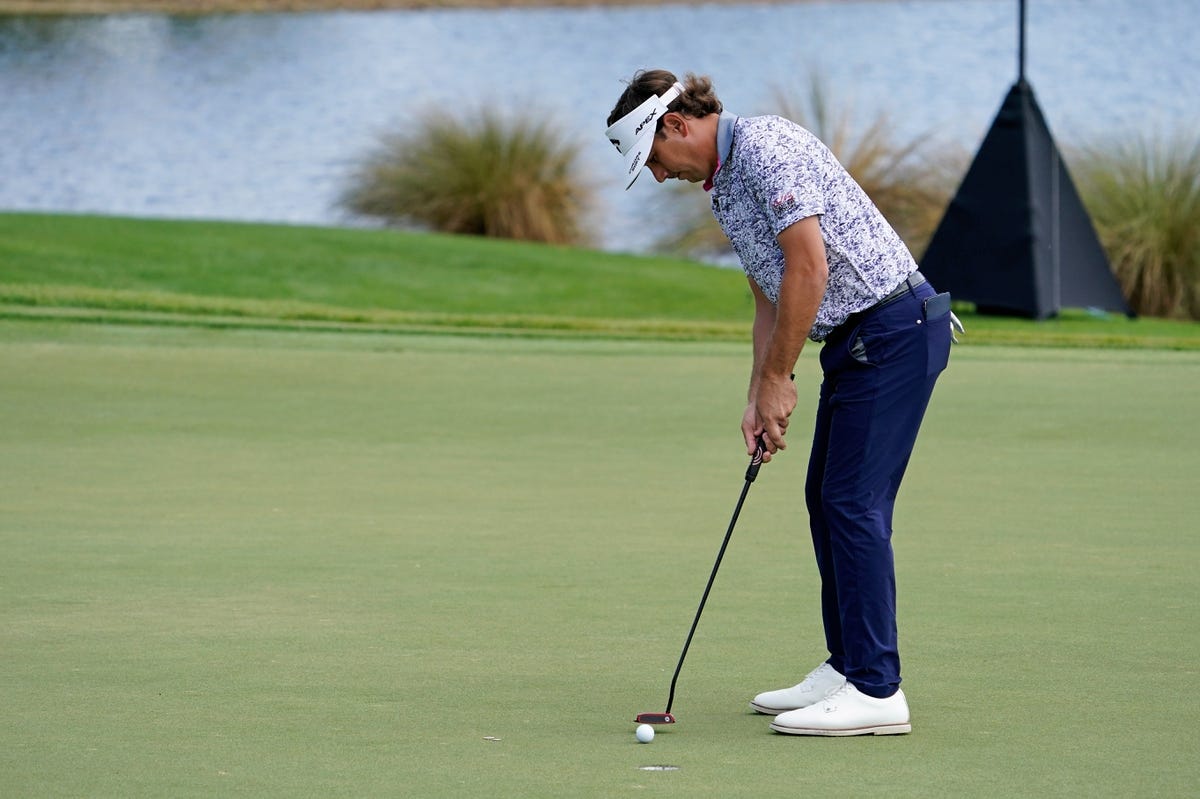 Mar 19, 2021; Palm Beach Gardens, Florida, USA; Kelly Kraft putts on the 1st hole during the second round of The Honda Classic golf tournament at PGA National (Champion). Mandatory Credit: Jasen Vinlove-USA TODAY Sports