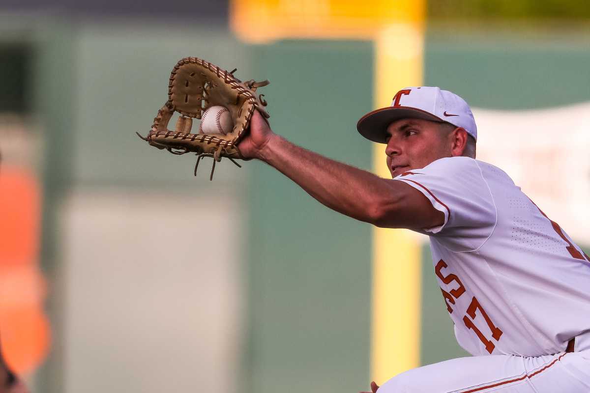 Texas infielder Ivan Melendez (17) catches a ball at first base during the game against Kansas at Disch-Falk Field in Austin, Texas on May 19, 2022