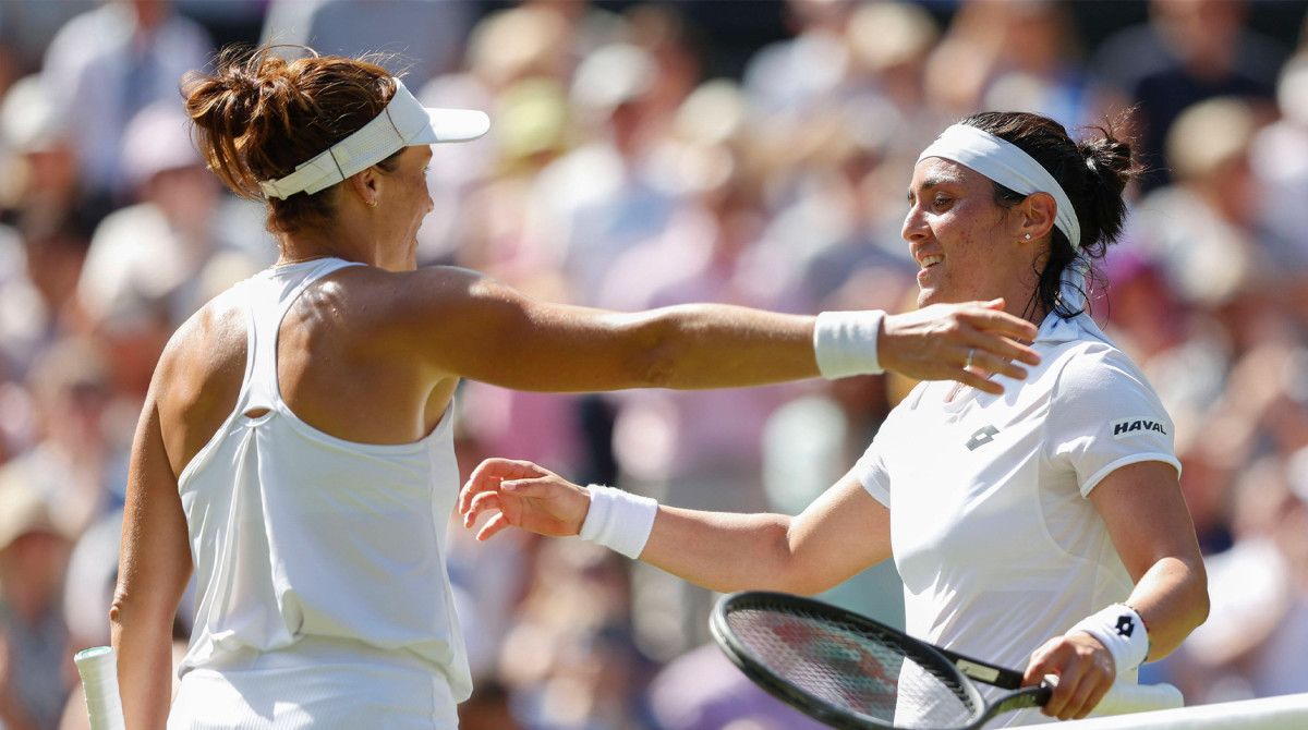 Tatjana Maria congratulates the winner Ons Jabeur Tennis Wimbledon 2022 Grand Slam