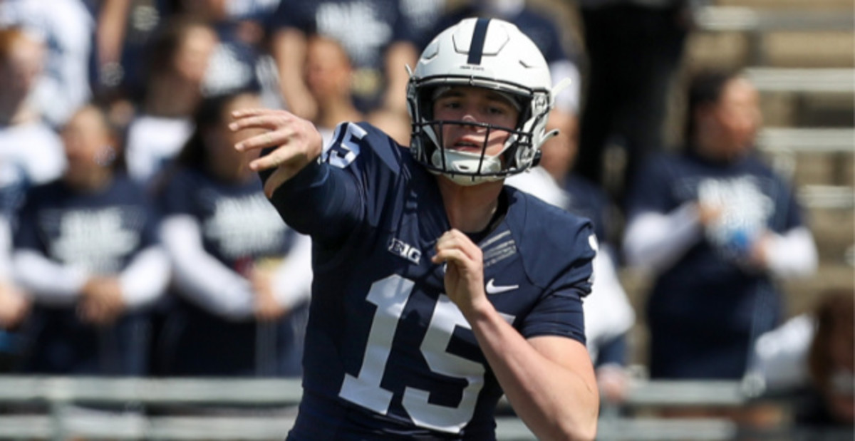 Penn State Nittany Lions quarterback Drew Allar attempts a pass during a college football game in the Big Ten.