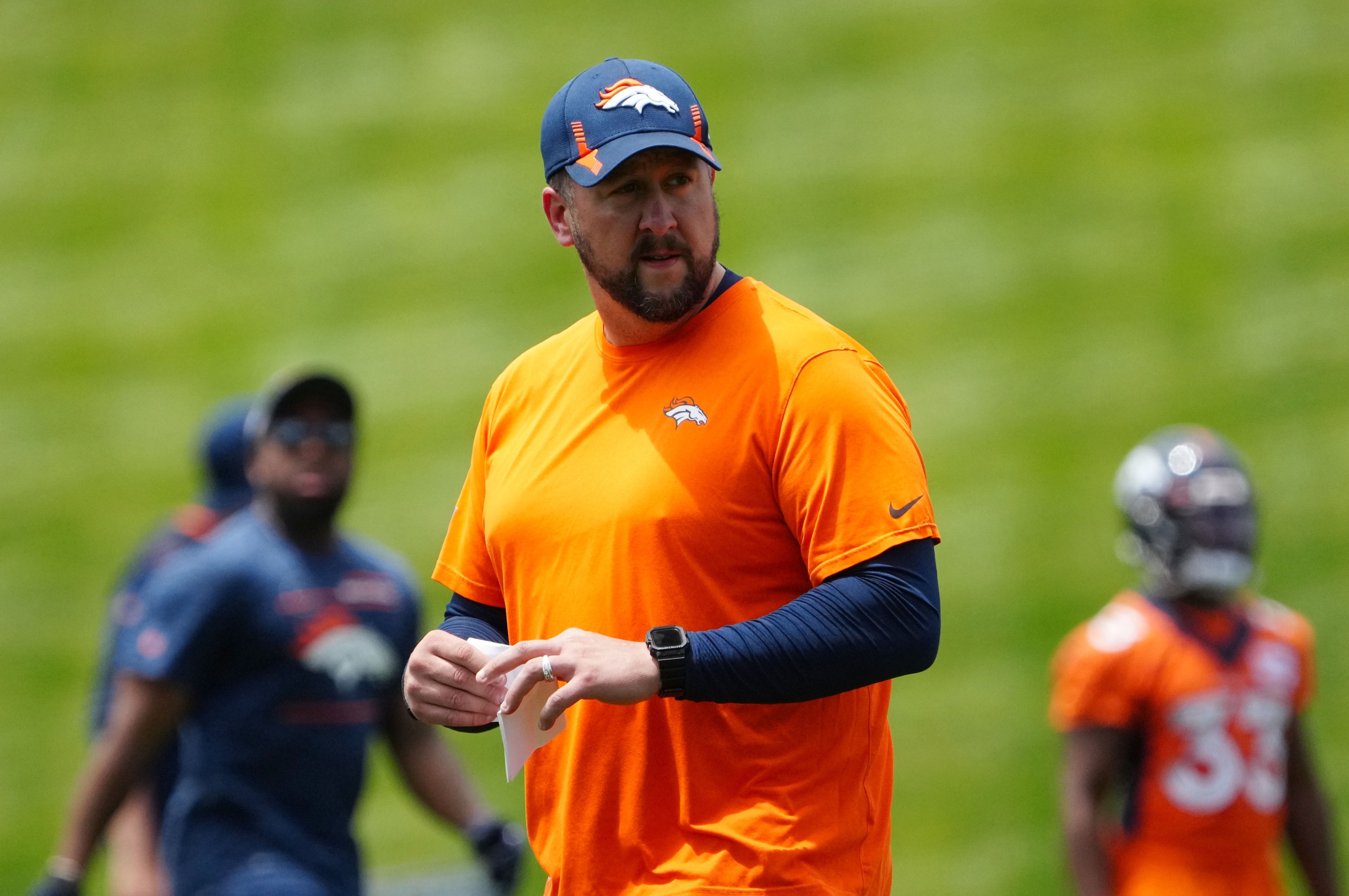 Report: Titans, Rams Request to Interview Broncos OC Justin Outten
