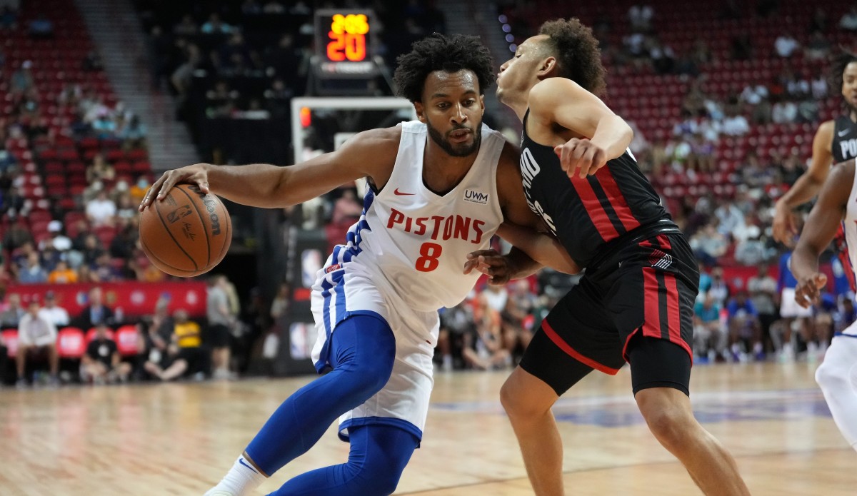 Detroit Pistons forward Braxton Key (8) dribbles against Portland Trail Blazers guard Colbey Ross (46) during an NBA Summer League game at T&M.