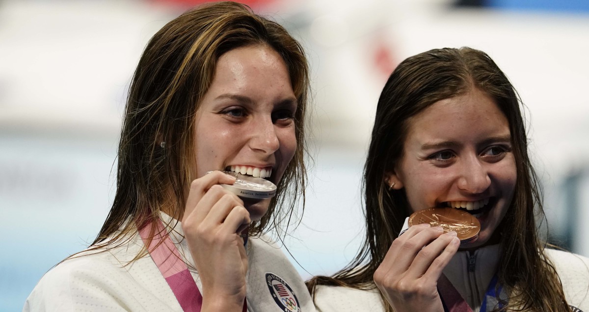 Alex Walsh (USA) and Kate Douglass (USA) pose with their medals during the medals ceremony for the women's 200m individual medley during the Tokyo 2020 Olympic Summer Games at Tokyo Aquatics Centre.