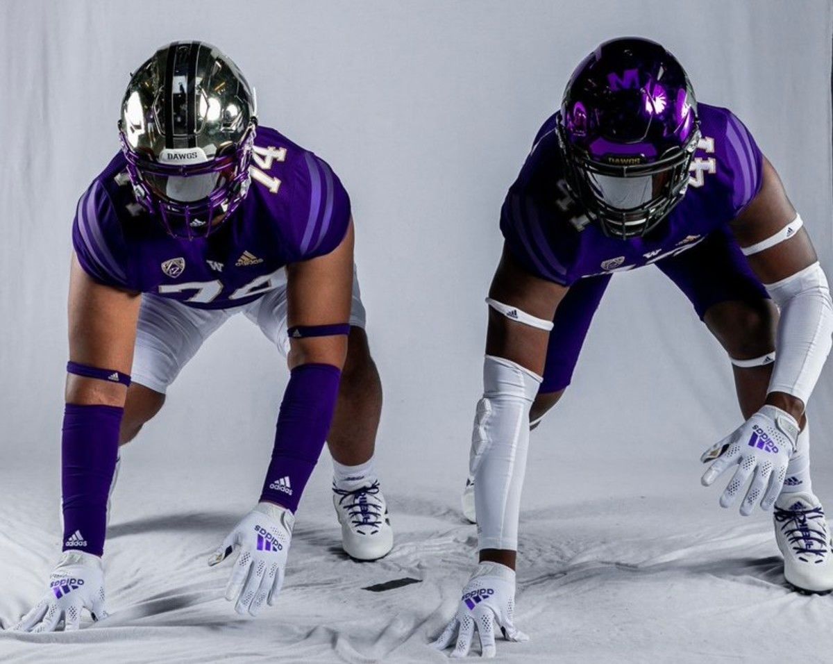 Elinneus Davis and Anthony James pose side by side at the UW.