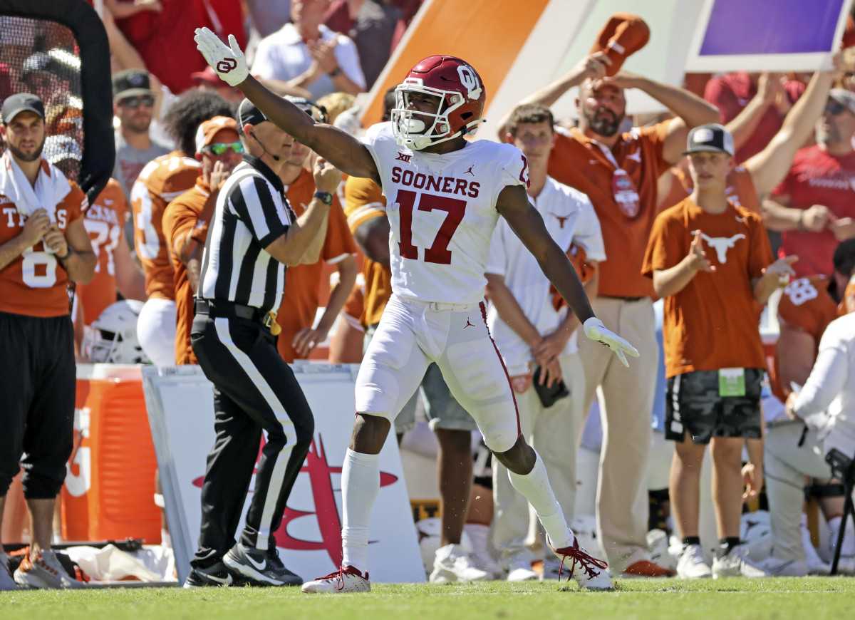 Oct 9, 2021; Dallas, Texas, USA; Oklahoma Sooners wide receiver Marvin Mims (17) reacts after making a catch in during the second half against the Texas Longhorns at the Cotton Bowl.