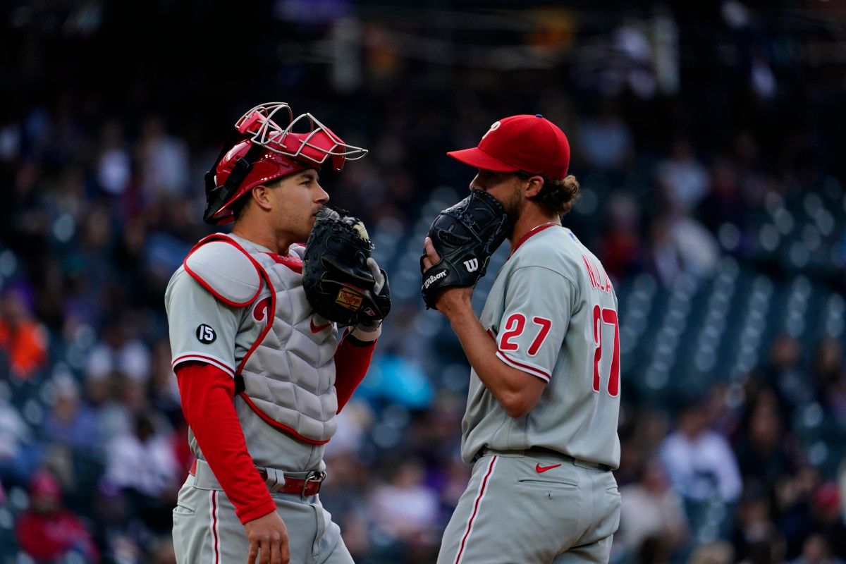 Aaron Nola and J.T. Realmuto have a meeting on the mound.