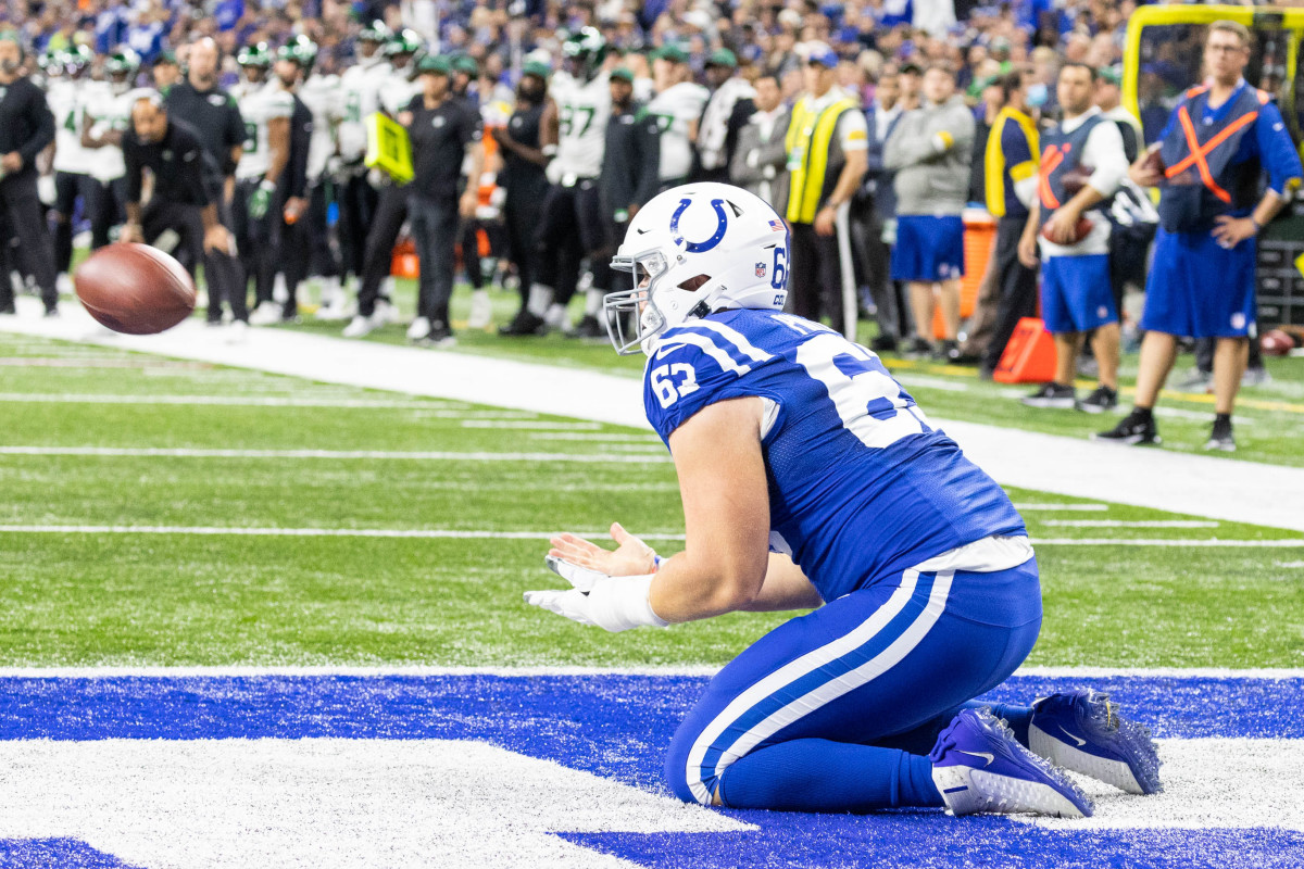 Nov 4, 2021; Indianapolis, Indiana, USA; Indianapolis Colts guard Danny Pinter (63) catches a touchdown pass in the second half against the New York Jets at Lucas Oil Stadium. Mandatory Credit: Trevor Ruszkowski-USA TODAY Sports
