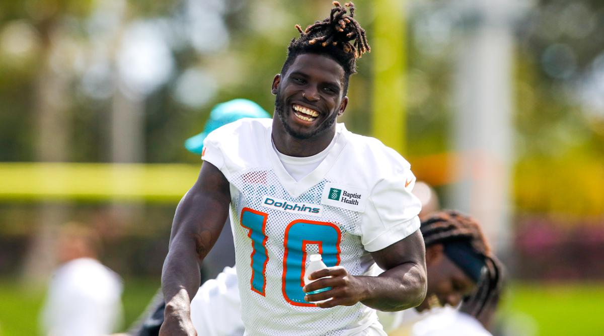 Jun 2, 2022; Miami Gardens, Florida, USA; Miami Dolphins wide receiver Tyreek Hill (10) reacts from the field during minicamp at Baptist Health Training Complex.