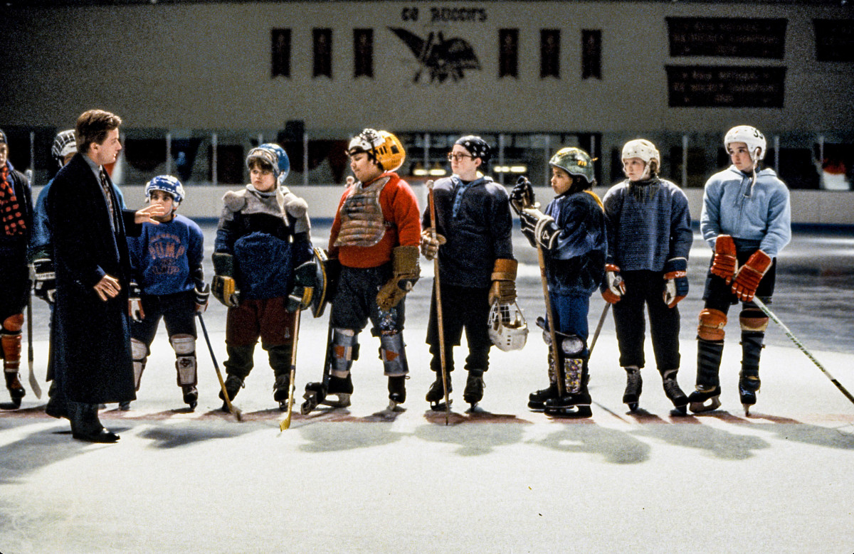 Weiss, as Goldberg, on ice with the cast of The Mighty Ducks.