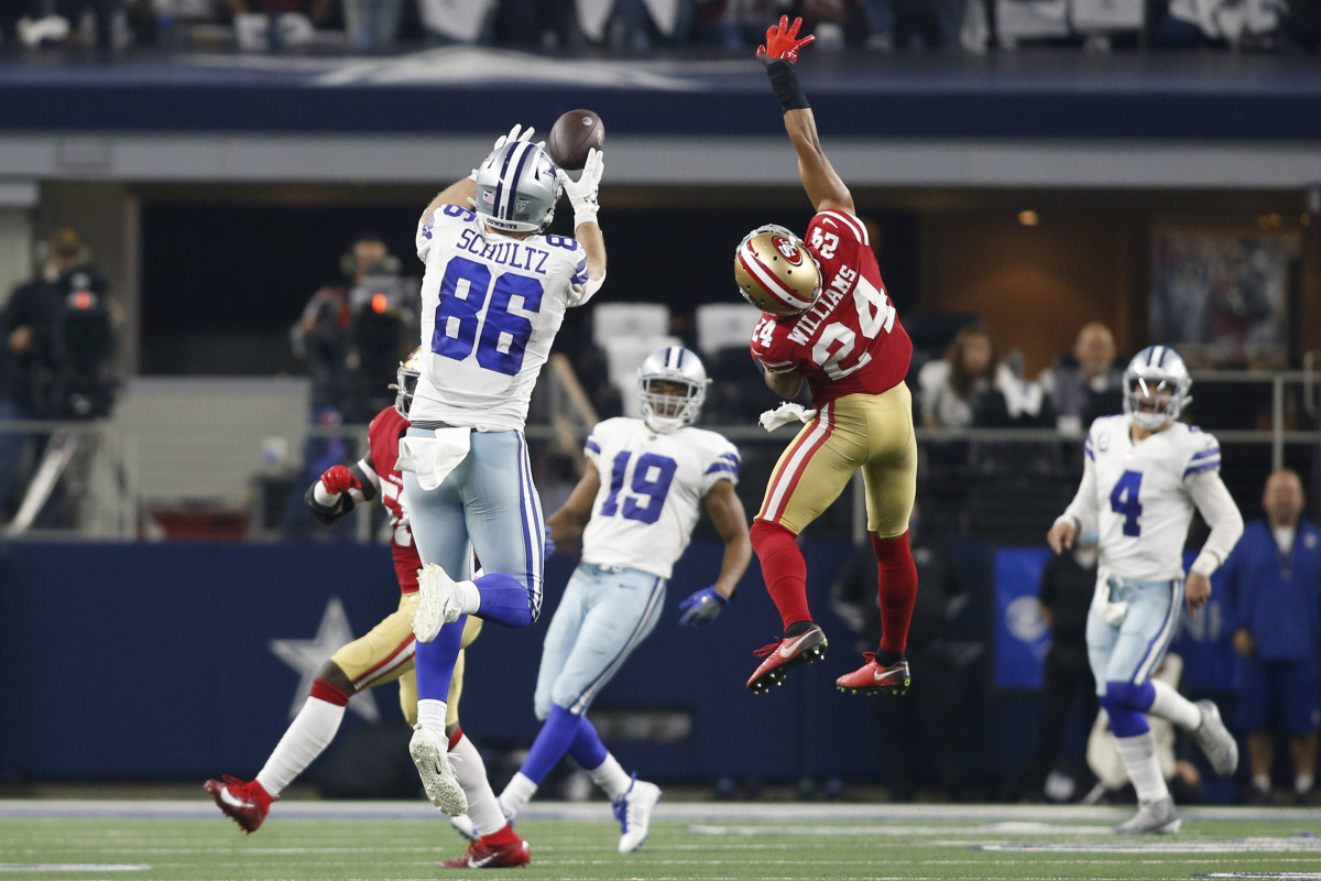 Dallas Cowboys tight end Dalton Schultz (86) catches a pass against San Francisco 49ers defensive back K'Waun Williams (24) in the fourth quarter in a NFC Wild Card playoff football game at AT&T Stadium.
