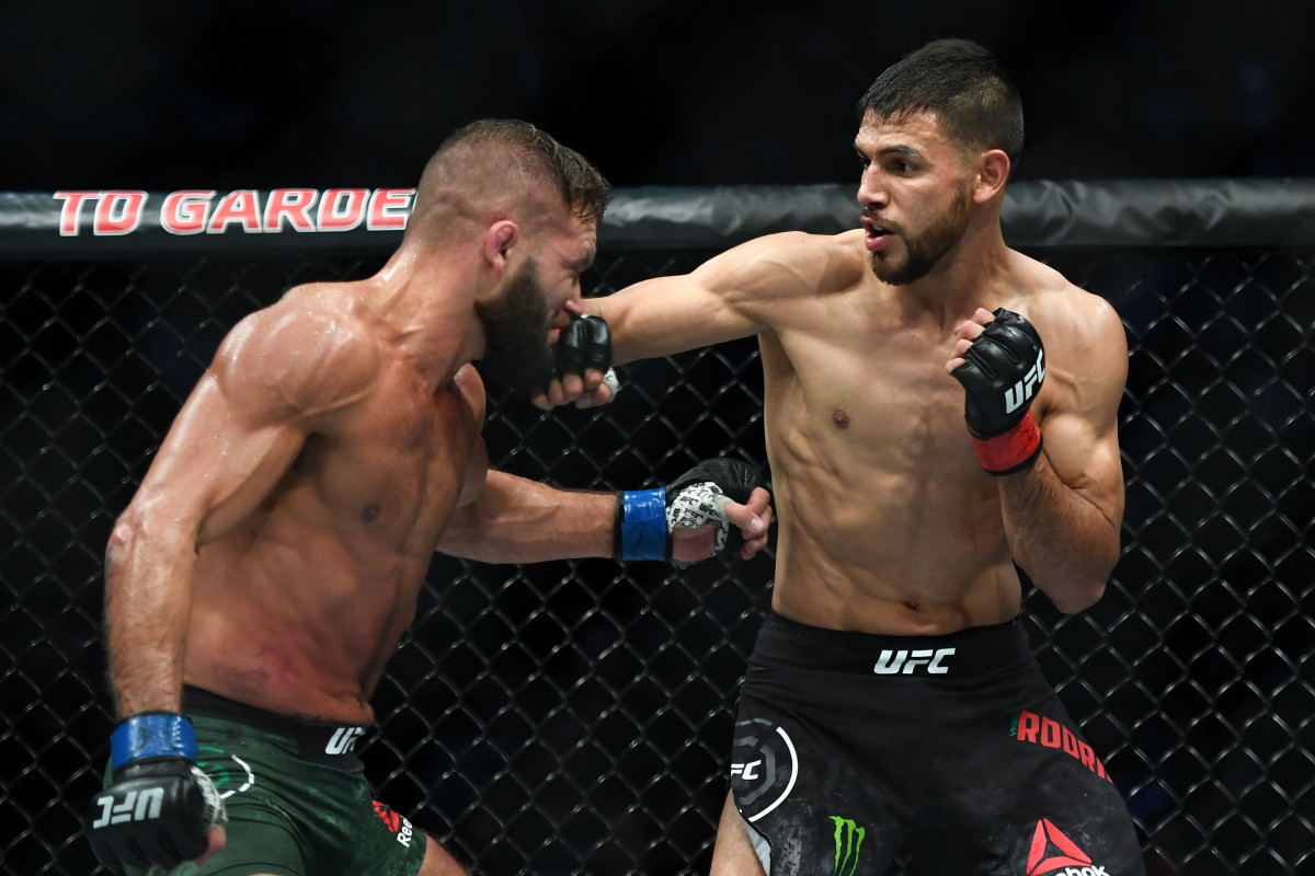 Yair Rodriguez (red) fights Jeremy Stephens (blue) in a featherweight bout during UFC Fight Night at the TD Garden.