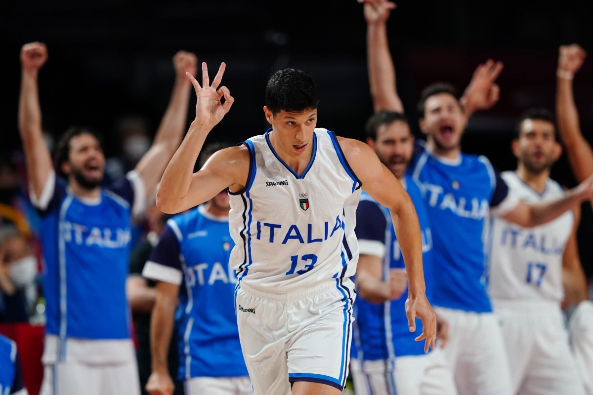 Italy player Simone Fontecchio (13) reacts after a made three point basket during the Tokyo 2020 Olympic Summer Games at Saitama Super Arena.