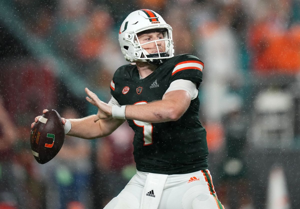 Miami Hurricanes quarterback Tyler Van Dyke (9) attempts a pass against the Virginia Tech Hokies during the second half at Hard Rock Stadium.