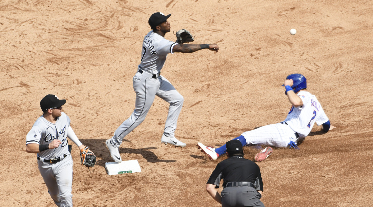 White Sox shortstop Tim Anderson forces out Cubs Nico Hoerner while trying to turn double play
