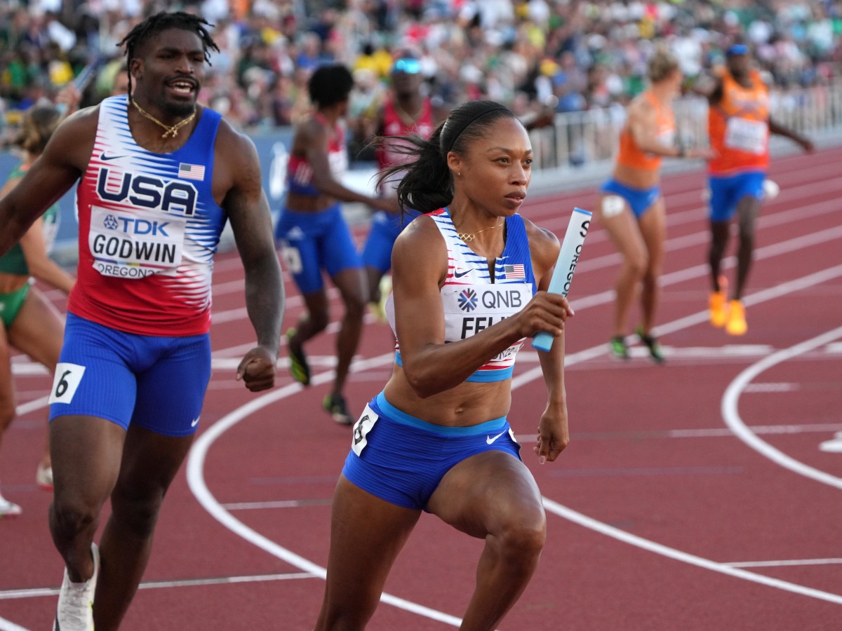 USA’s Allyson Felix runs the second leg of the mixed relay at the world championships in Eugene, Oregon.