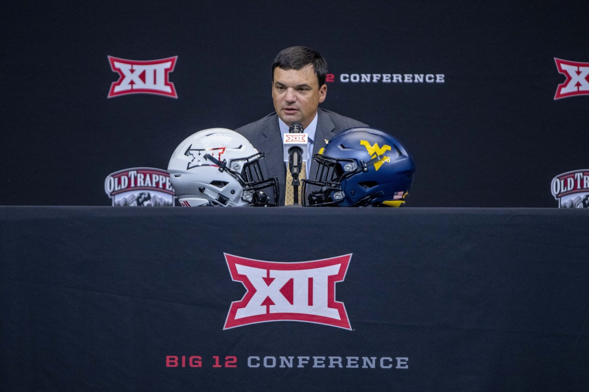 Jul 13, 2022; Arlington, TX, USA; West Virginia Mountaineers head coach Neal Brown is interviewed during the Big 12 Media Day at AT&T Stadium.