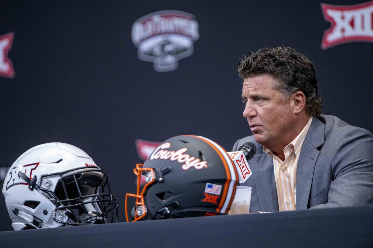 Jul 13, 2022; Arlington, TX, USA; Oklahoma State Cowboys head coach Mike Gundy is interviewed during the Big 12 Media Day at AT&T Stadium.
