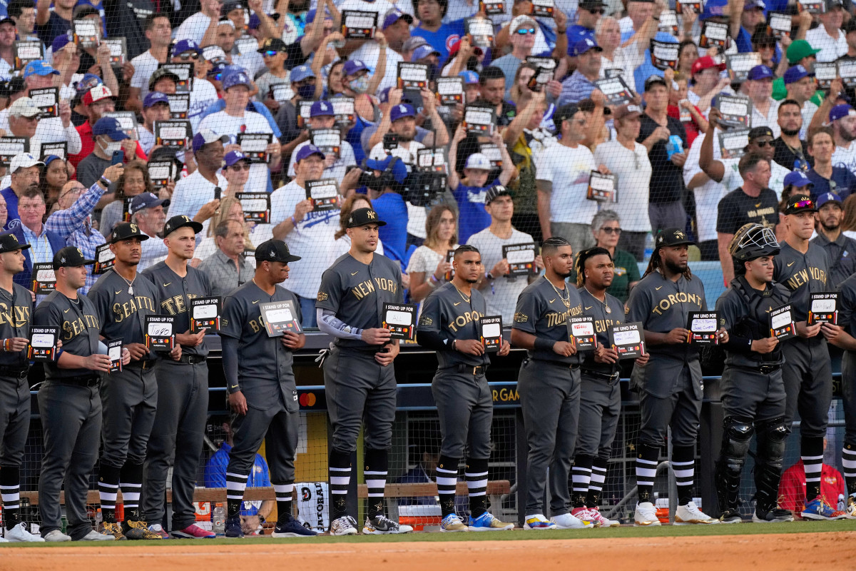 American League players stand up to cancer.