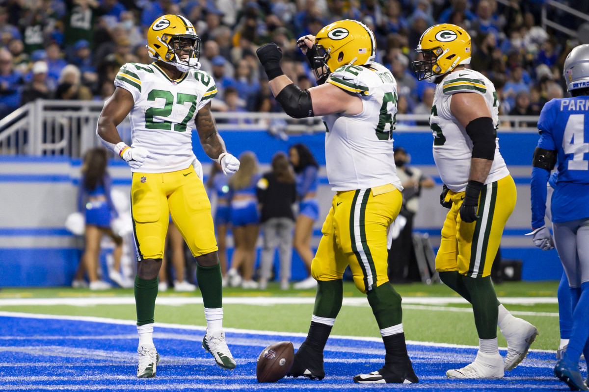 Green Bay Packers Activate Surprise Player Prior To Chicago Bears Matchup (Breaking) 2 Jan 9, 2022; Detroit, Michigan, USA; Green Bay Packers running back Patrick Taylor (27) celebrates his touchdown against the Detroit Lions during the second half at Ford Field. Mandatory Credit: David Reginek-USA TODAY Sports (Chicago Bears)