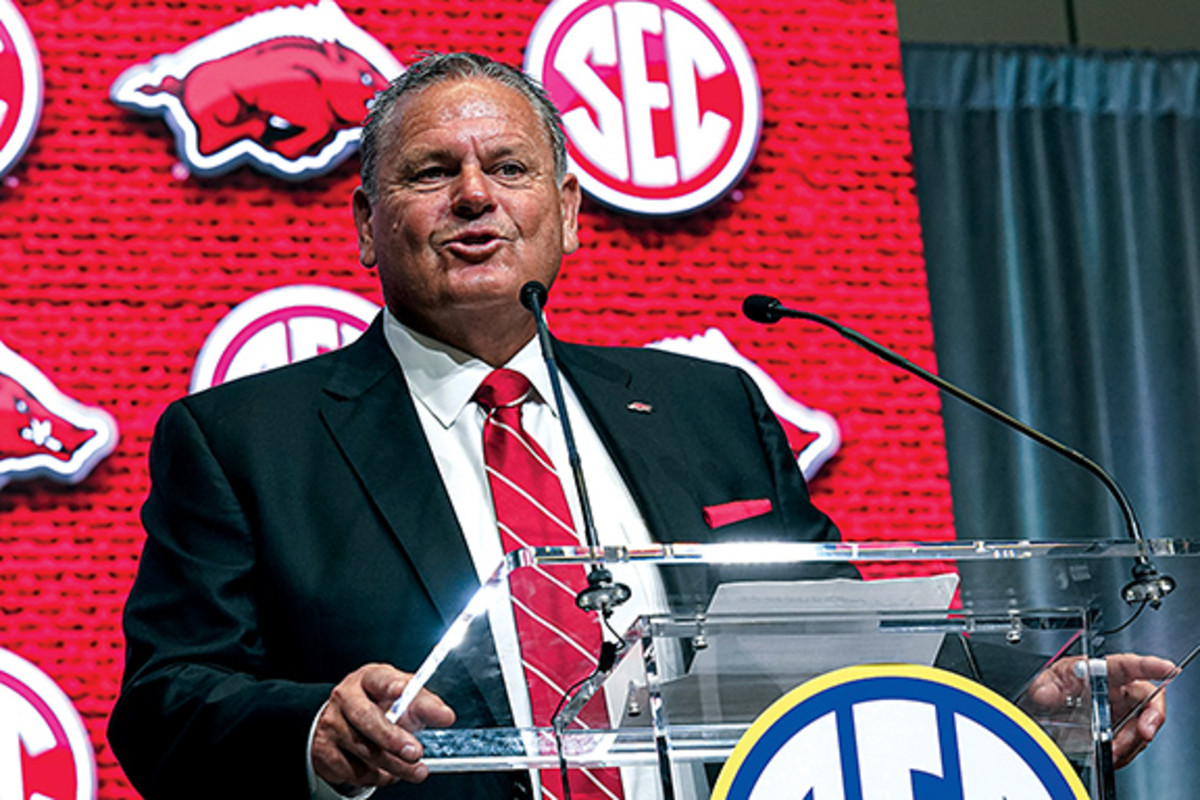Arkansas football coach Sam Pittman addresses the media Wednesday morning in Atlanta. While Pittman isn't exactly comfortable at the podium, he was perfectly at home an hour later with the SEC Now crew where he found out Arkansas would host the show for the first weekend of the football season when the Razorbacks play Cincinnati.