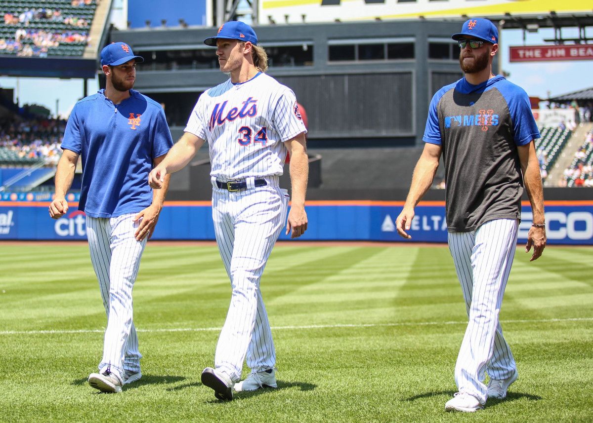 Noah Syndergaard with Zack Wheeler and Steven Matz in 2019.