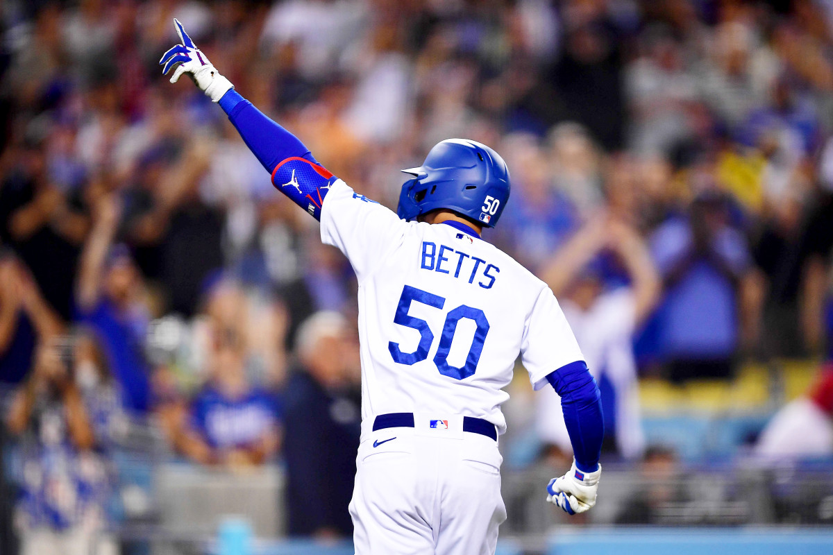 Jun 14, 2022; Los Angeles, California, USA; Los Angeles Dodgers right fielder Mookie Betts (50) celebrates his solo home run hit against the Los Angeles Angels during the eighth inning at Dodger Stadium.