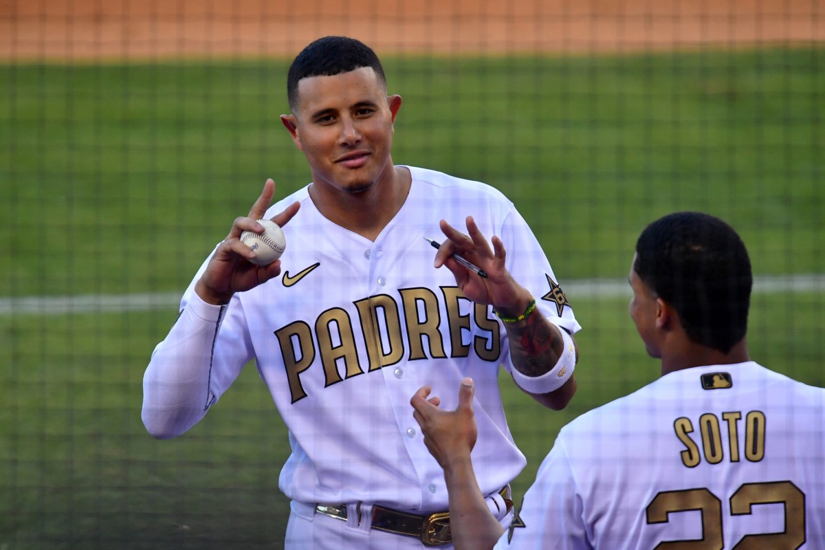 ational League third baseman Manny Machado (13) of the San Diego Padres gestures to fans in the fourth inning against the American League at Dodger Stadium. (Gary A. Vasquez-USA TODAY Sports)