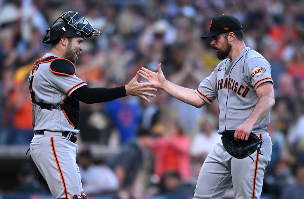 San Francisco Giants starting pitcher Carlos Rodon (right) celebrates with catcher Austin Wynns (left) after the Giants defeated the San Diego Padres at Petco Park. (Orlando Ramirez-USA TODAY Sports)