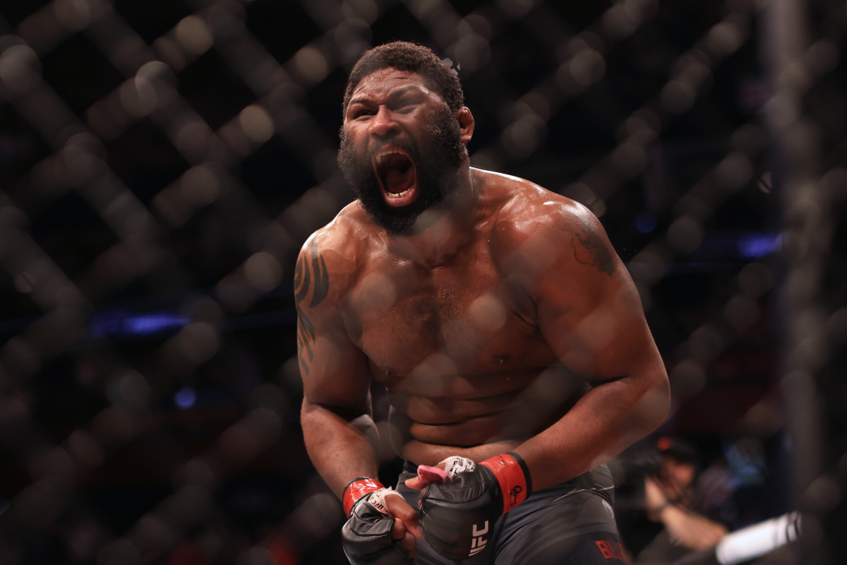 Curtis Blaydes (red gloves) reacts to defeating Chris Daukaus (blue gloves) during UFC Fight Night at Nationwide Arena.