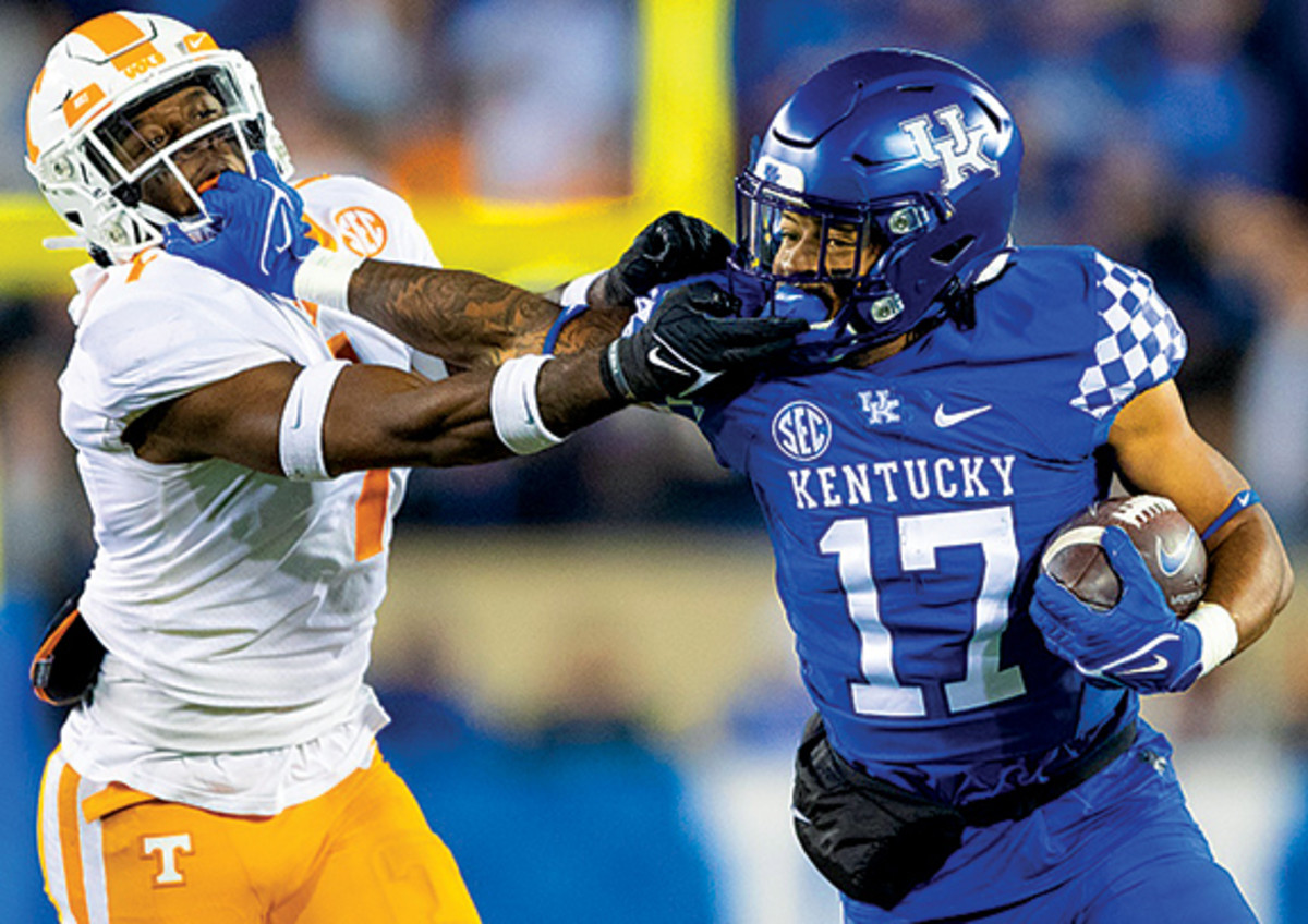 Tennessee Volunteers defensive back Trevon Flowers (1) chases down Kentucky Wildcats running back JuTahn McClain (17) during the second quarter at Kroger Field.