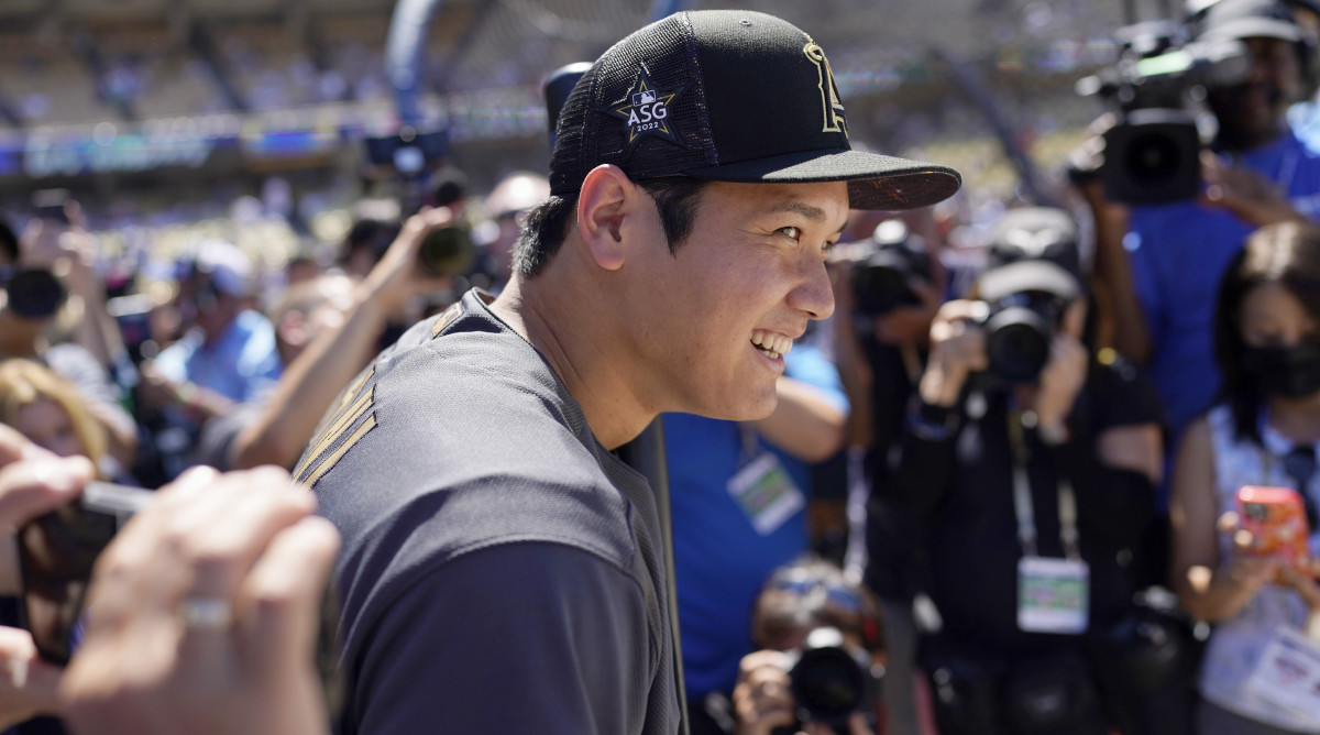 Shohei Ohtani, of the Los Angeles Angels, smiles during batting practice before the MLB All-Star baseball game against the American League, Tuesday, July 19, 2022, in Los Angeles.