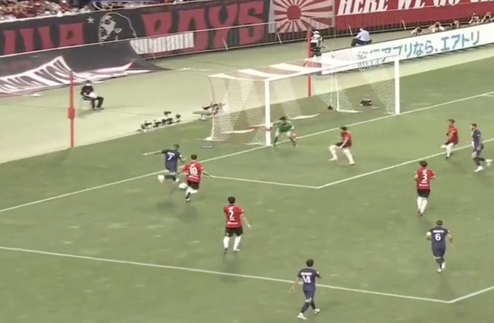 PSG no.7 Kylian Mbappe pictured shooting to score a brilliant pre-season goal against Urawa Red Diamonds