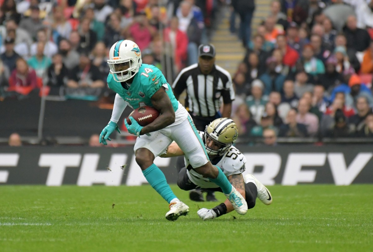 Oct 1, 2017; Miami Dolphins receiver Jarvis Landry (14) is defended by New Orleans Saints linebacker A.J. Klein (53). Mandatory Credit: Kirby Lee-USA TODAY Sports