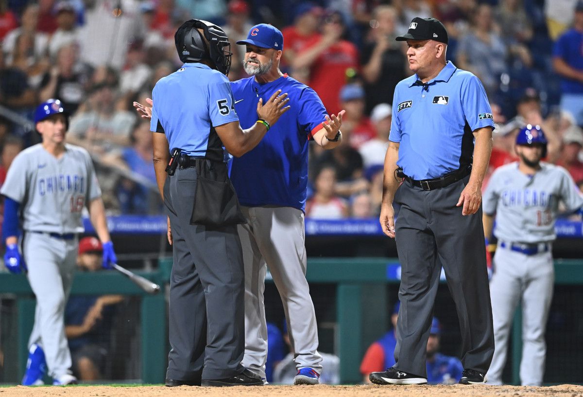 David Ross is ejected arguing balls and strikes in the 10th.