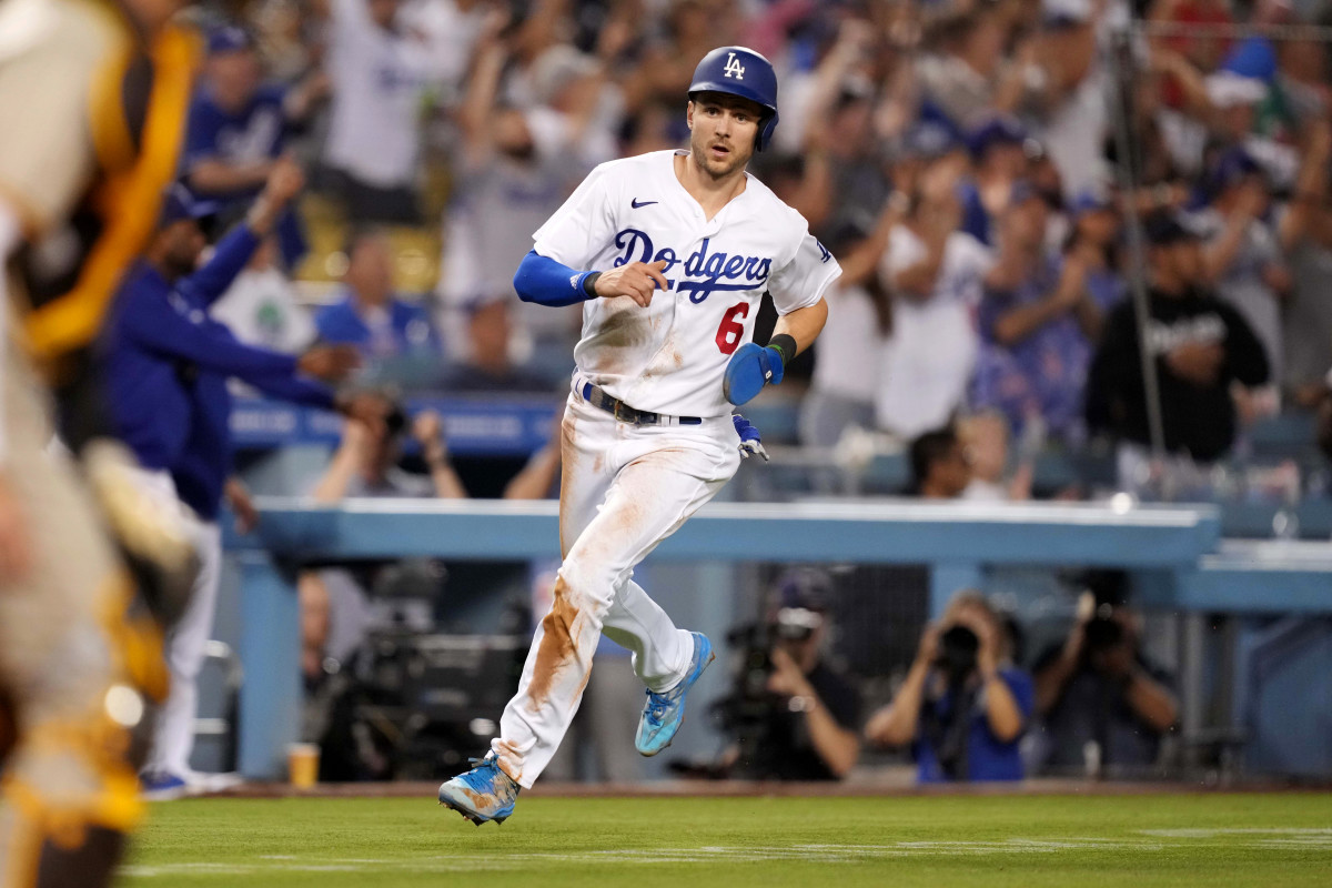 Dodgers shortstop Trea Turner rounds third base to score in the eighth inning against the Padres at Dodger Stadium.