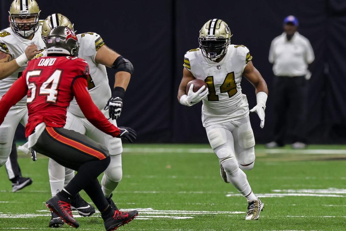 Oct 31, 2021; New Orleans Saints running back Mark Ingram II (14) runs against the Tampa Bay Buccaneers. Mandatory Credit: Stephen Lew-USA TODAY Sports