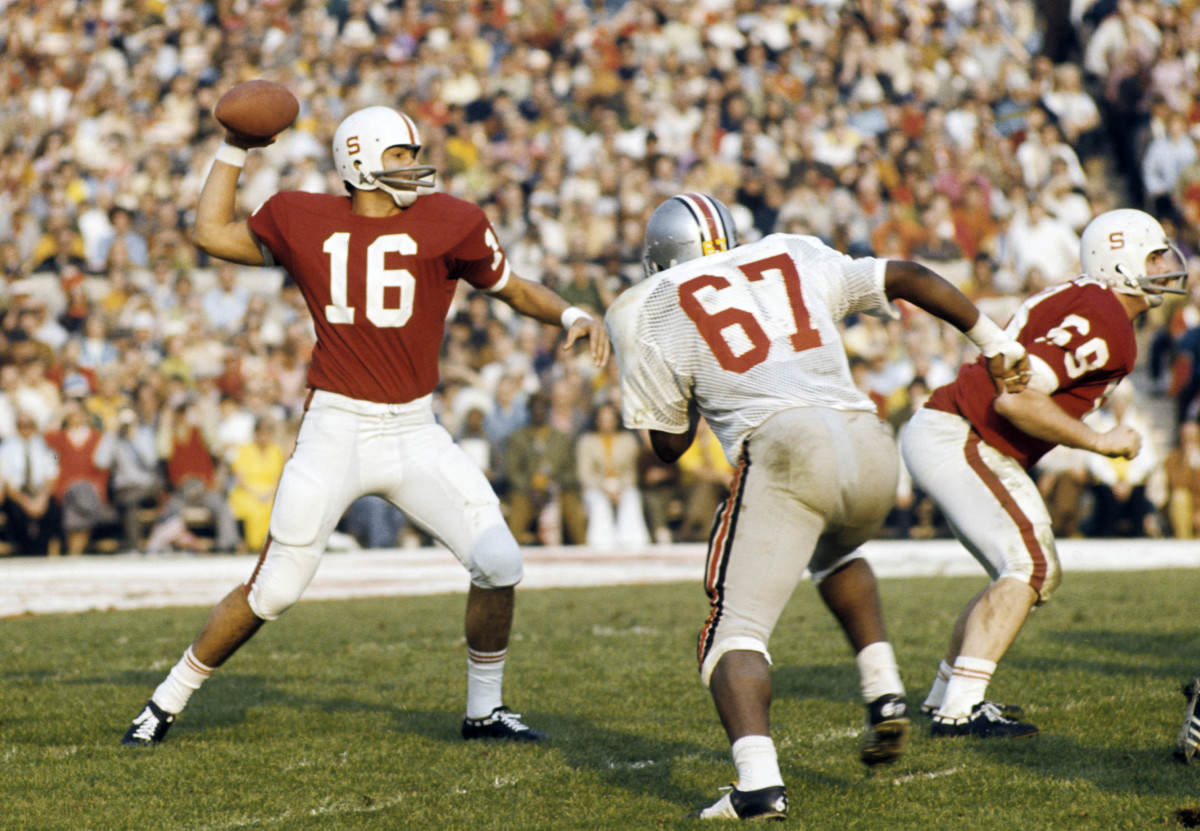 Stanford Cardinal quarterback Jim Plunkett (16) throws the ball against the Ohio State Buckeyes during the 1971 Rose Bowl game where Stanford beat OSU 27-17 at the Rose Bowl