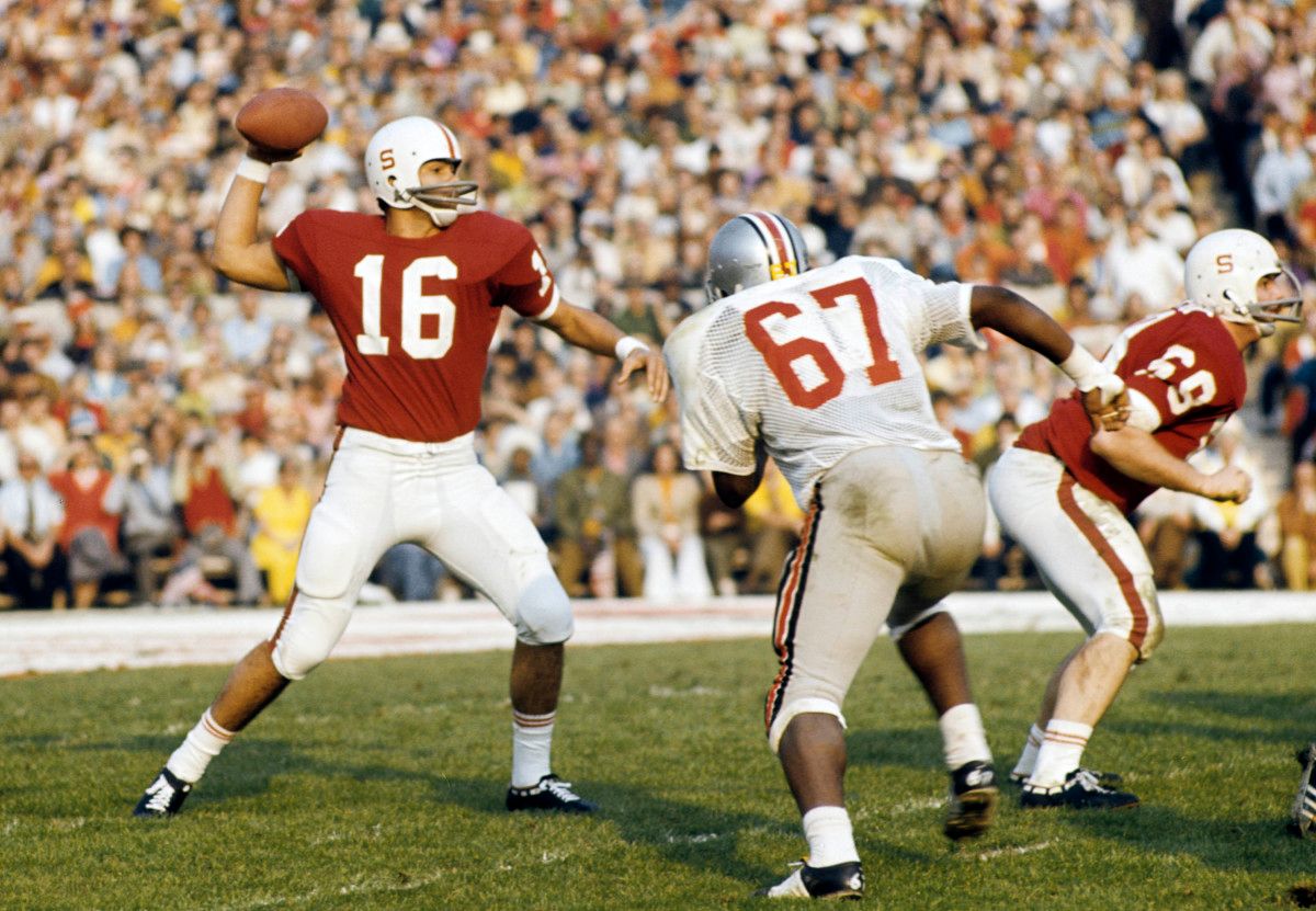 Stanford Cardinal quarterback Jim Plunkett (16) throws the ball against the Ohio State Buckeyes during the 1971 Rose Bowl game where Stanford beat OSU 27-17 at the Rose Bowl
