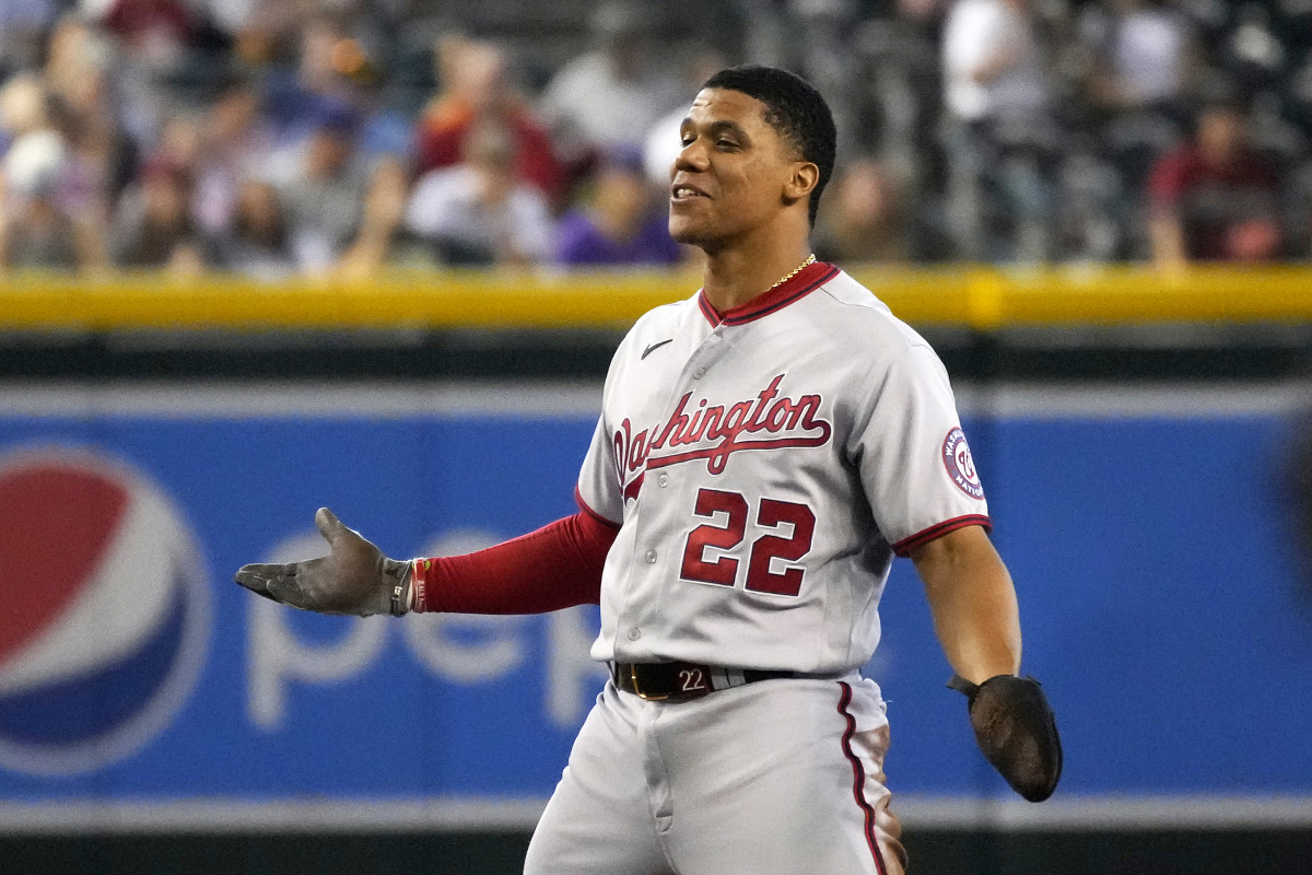 Washington Nationals’ Juan Soto jokes around with the Arizona Diamondbacks in the first inning during a baseball game, Sunday, July 24, 2022, in Phoenix.