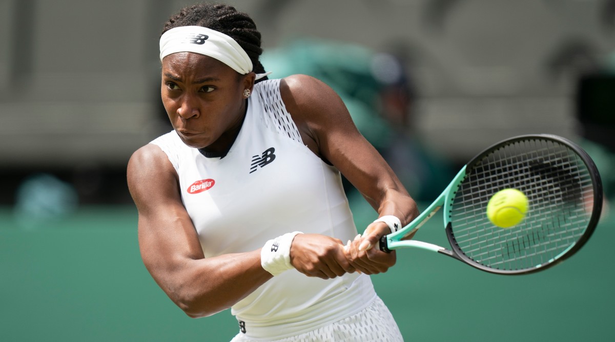 Coco Gauff (USA) returns a shot during her match against Amanda Anisimova (USA) on day six at the 2022 Wimbledon Championships.