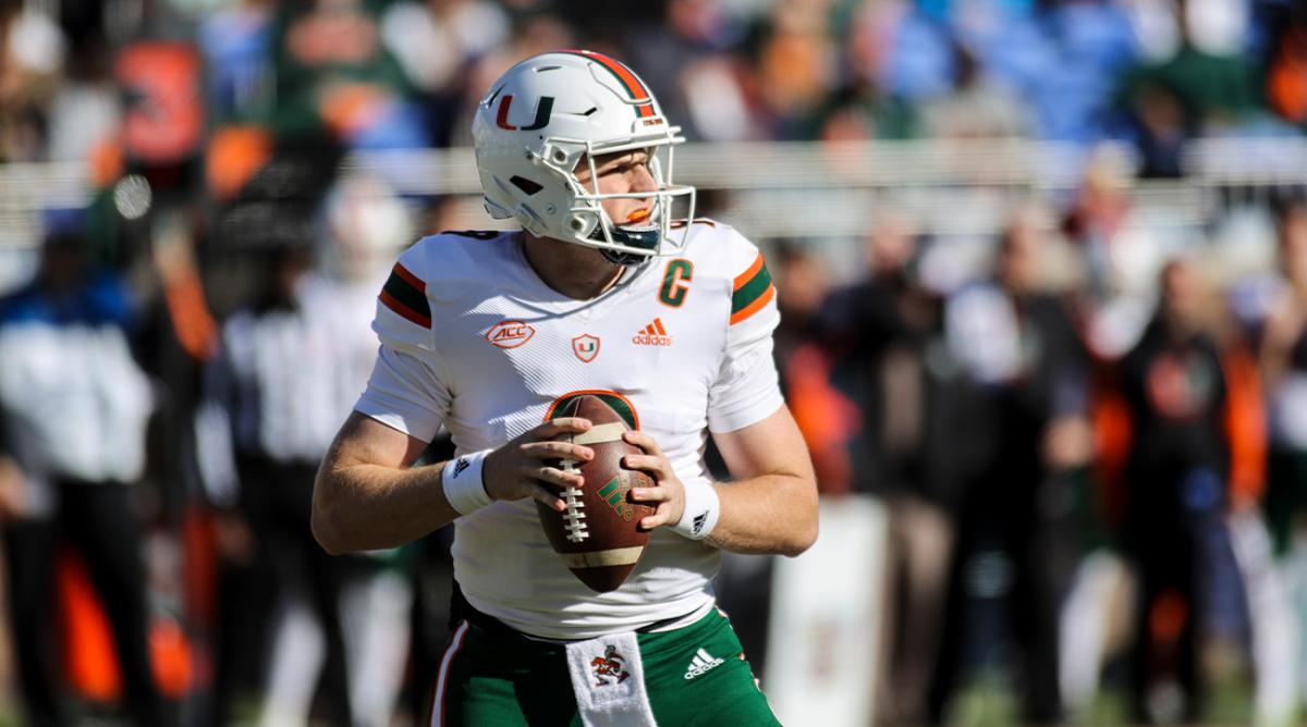 Nov 27, 2021; Durham, North Carolina, USA; Miami Hurricanes quarterback Tyler Van Dyke (9) with the ball during the first half of the game against the Miami Hurricanes at Wallace Wade Stadium. at Wallace Wade Stadium.