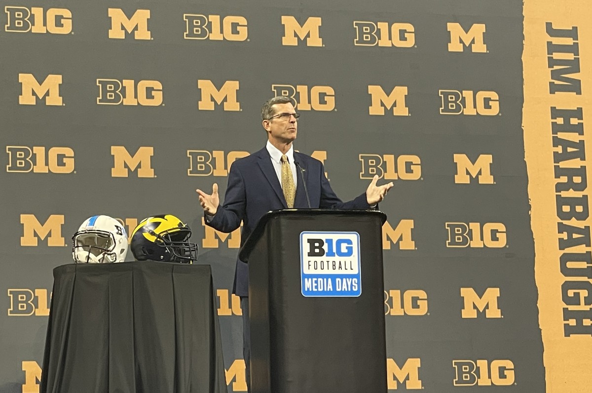 Michigan football head coach Jim Harbaugh talks at Big Ten Football Media Days.